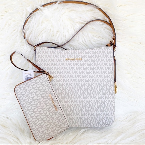 Michael Kors Handbags - NWT Michael Kors Crossbody/Wristlet